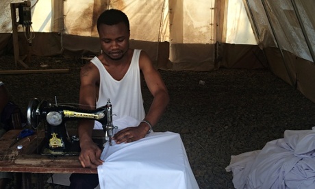 Sewing the ceiling of the MSF treatment centre in Freetown