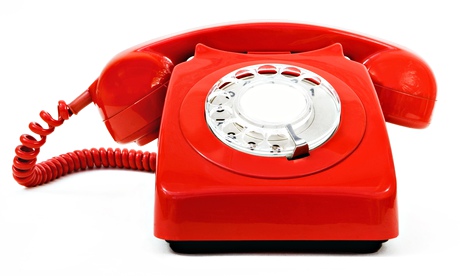 big, red old-style rotary phone