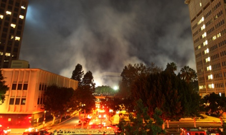 Firefighters battle a fire that destroyed a seven-story apartment building under construction on 8 December 2014 in Los Angeles, California.