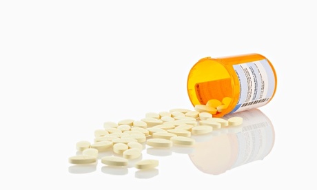 Pills spilling from container