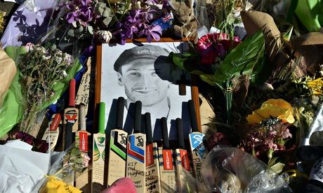 Bats and caps are left outside the Adelaide Oval