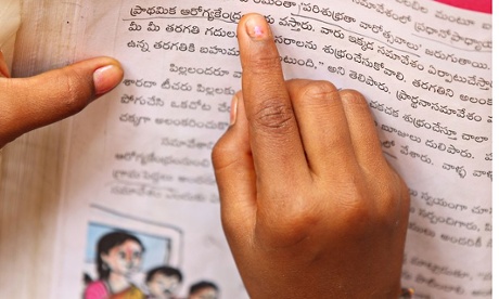 Indian school girl reading