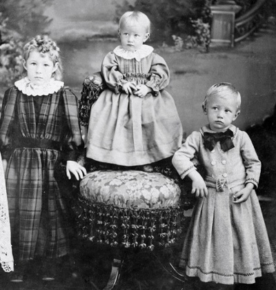 photo of three norwegian american boys in gowns