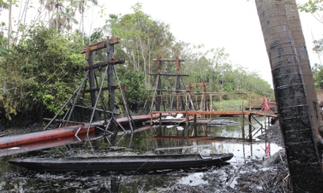 Scaffolding holds a broken section of the oil pipeline.
