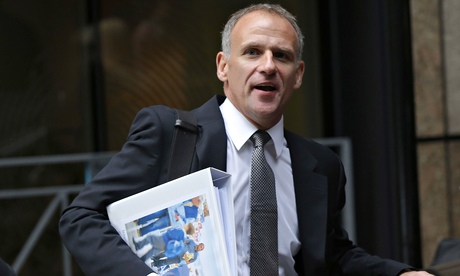 Tesco chief executive Dave Lewis leaving an office