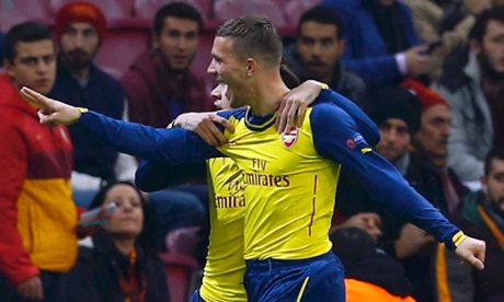 Arsenal's Lukas Podolski celebrates his goal against Galatasaray.