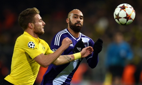 Dortmund' Ciro Immobile and Anderlecht's Anthony Vanden Borre vie for the ball.