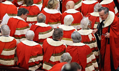 Peers wait as Queen Elizabeth II attends the state opening of parliament