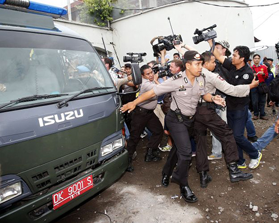 Corby: Police scuffle