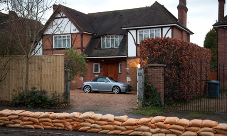 A sandbag wall in Datchet constructed by over a hundred Royal Navy engineers last night protects a house from flooding should the level of the River Thames continue to rise as expected.