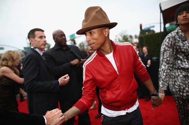 Pharrell Williams and Helen Lasichanh attend the 56th GRAMMY Awards at Staples Center on January 26, 2014 in Los Angeles, California.