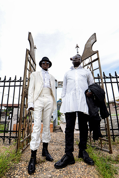 FTA: La Sape: Mwetu (L) and Mozar, two Sapeurs, pose as arrive at the Gombe cemetery in K