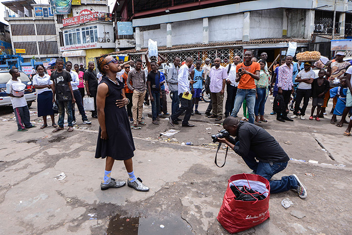 FTA: La Sape: Mzee Kindingu poses for a photographer in Kinshasa 