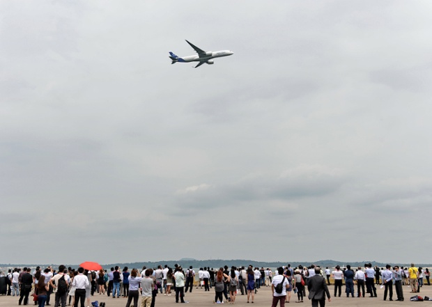 An Airbus A350-900 does a fly over during the Singapore Air Show