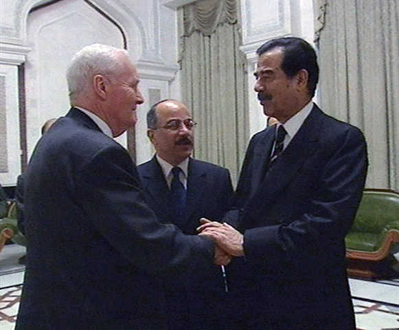 Tony Benn in pictures: Tony Benn is greeted by the Iraqi President Saddam Hussein prior to an inte