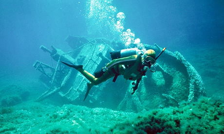 scuba diver with shipwreck underwater in Gozo Malta. Image shot 2001. Exact date unknown.