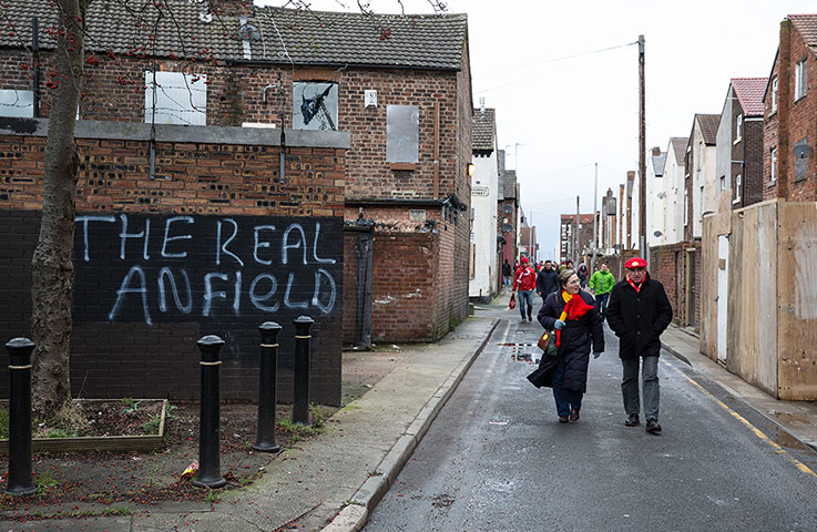 original observer: Fans on their way to Liverpool v Arsenal