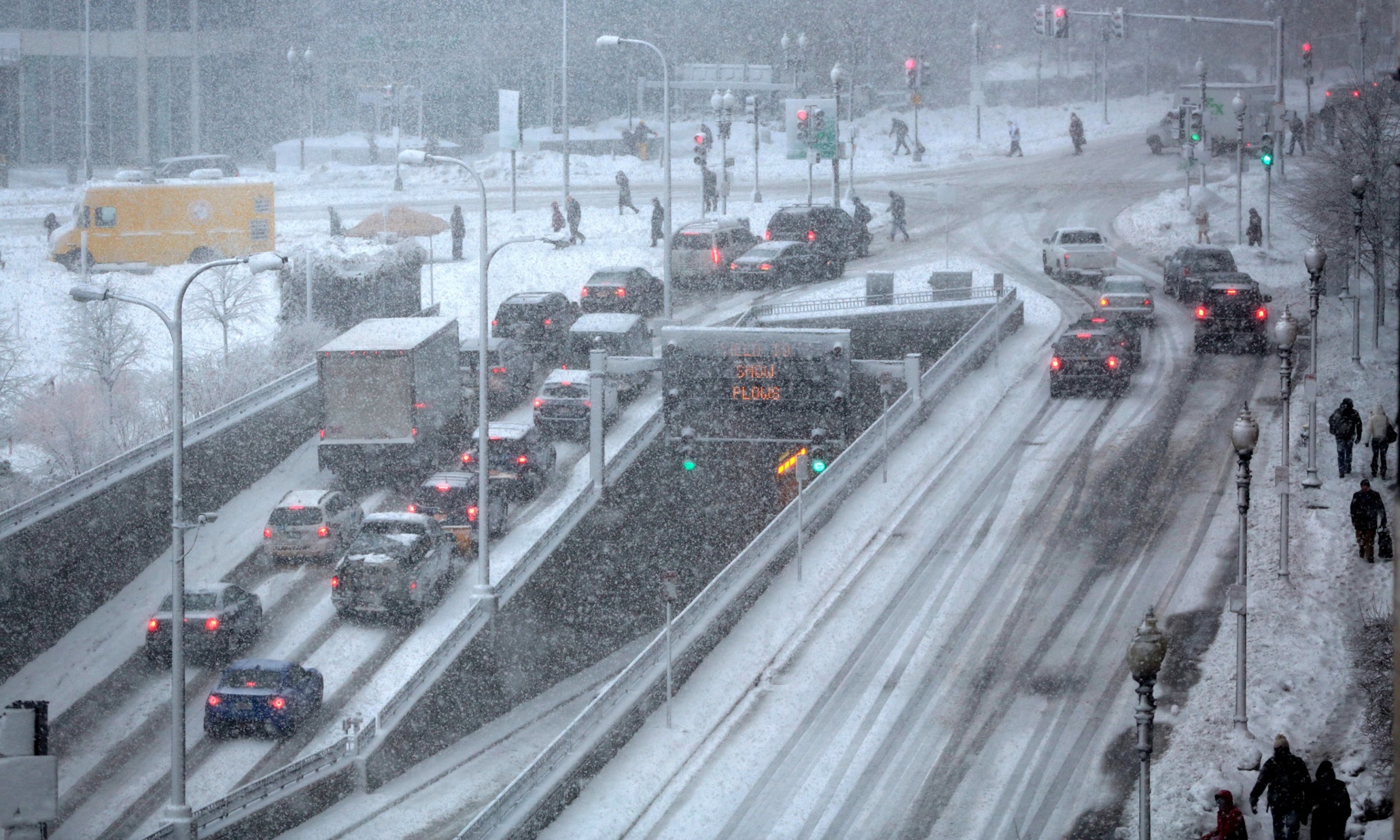 At least 17 dead as winter storm blankets northeastern US in snow US