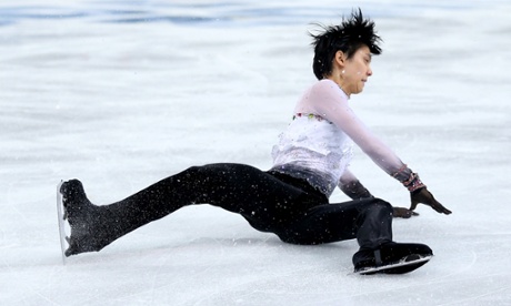 Yuzuru Hanyu of Japan falls as he competes during the men's free skating on day seven of the Sochi Winter Olympics.