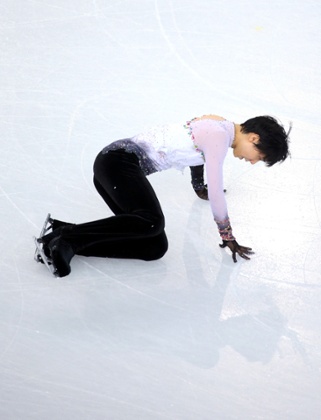 Yuzuru Hanyu of Japan falls during the men's free skating final in Sochi.