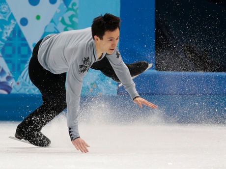 Patrick Chan of Canada falls as he competes in the men's free skate figure skating final at the Iceberg Skating Palace during the 2014 Winter Olympics in Sochi.