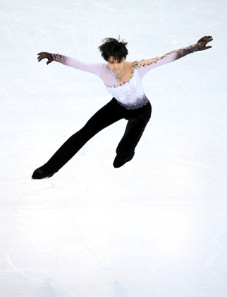 Yuzuru Hanyu of Japan wins gold at the men's free figure skating on day seven of the Sochi 2014 Winter Olympics.