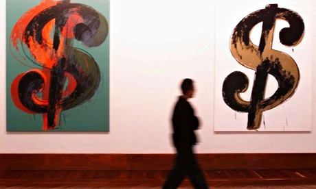 Two of Andy Warhol's paintings hang in a gallery