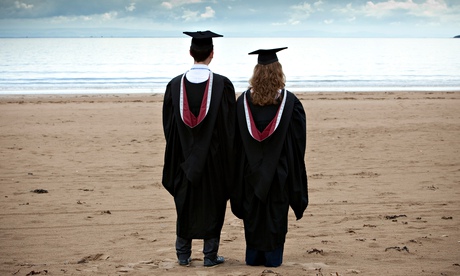 A Male and female graduate 