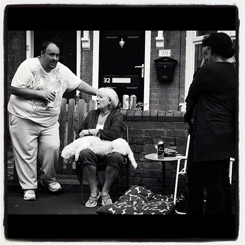 Your Pics - neighbours: black and white pic of three people in front of house