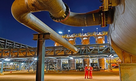 Workers at the BHP Billiton's Macedon gas plant during its opening in Onslow, Western Australia.