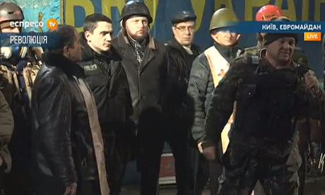 Protests leaders address the crowd in Independence Square, Kiev as violent clashes between demonstrators and police again flare up on Tuesday night.