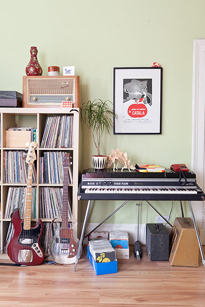 Homes - Glasgow: musical instruments in lounge with green walls