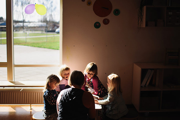 Big Pic - Down's Syndrome: small children in kindergarten classroom with teacher