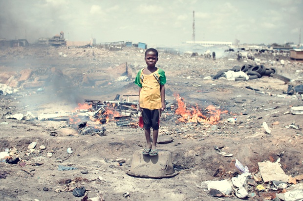 Kwabena Labobe, 10. His parents are not able to send him to school and forbid him to burn e-waste.