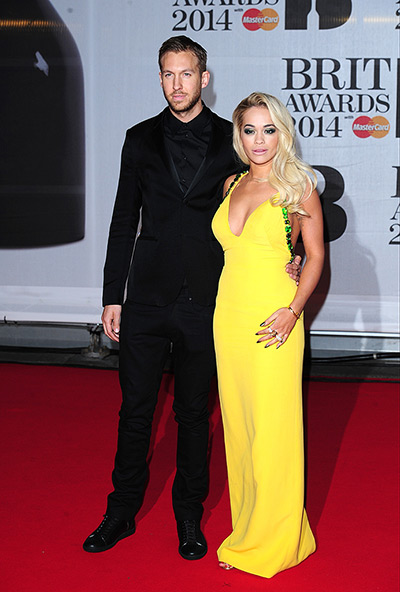 Brit Awards red carpet: Calvin Harris (and Rita Ora arriving for the 2014 Brit Awards