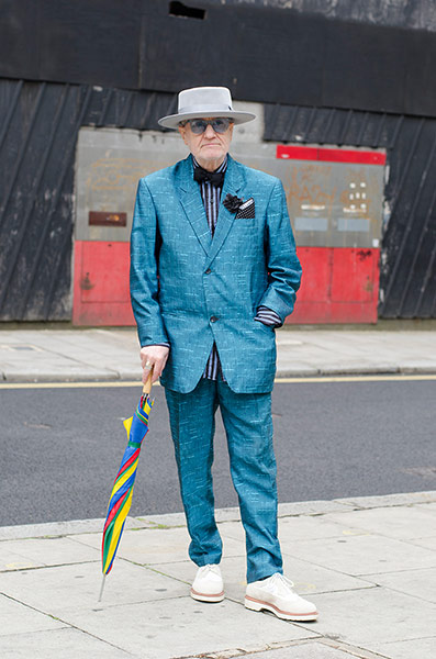 Older Models - Weekend : man in blue suit and grey hat 