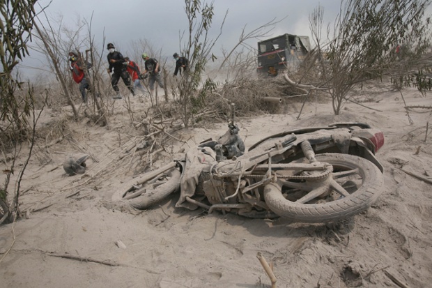 Rescuers search for victims after Mount Sinabung erupted in  North Sumatra, Indonesia.