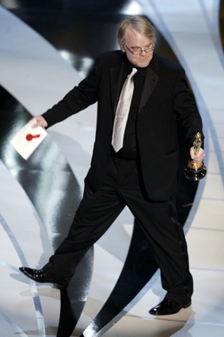 Philip Seymour Hoffman accepts his Oscar for best actor at the Academy Awards in 2006