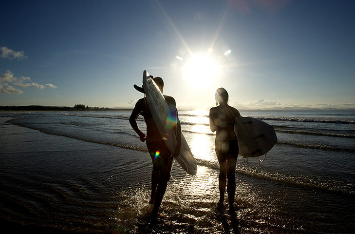 Australia costal: Australia: surfers approaching the Pacific on Maroubra beach