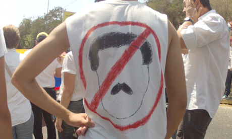 Protester wears 'no more Maduro' shirt in Valencia, Venezuela