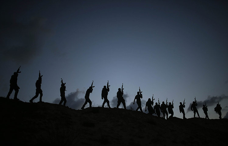 20 Photos: Palestinian Hamas militants march during a training exercise in Gaza
