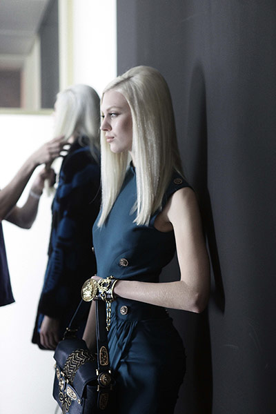 Versace: Models queue for the catwalk