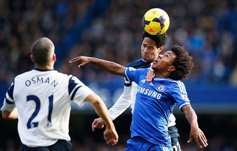 saturday's matches: Willian loses out in an aerial battle with Steven Pienaar 