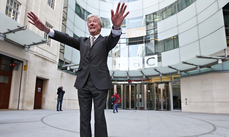 Tony Hall poses for photographers