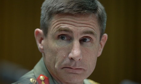 Commander of Operation Sovereign borders Lieutenant Angus Campbell reacts during Senate Estimates at Parliament House in Canberra, Tuesday, Feb. 25, 2014