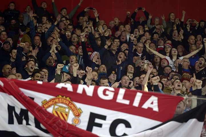 united champions league: Manchester United fans cheer