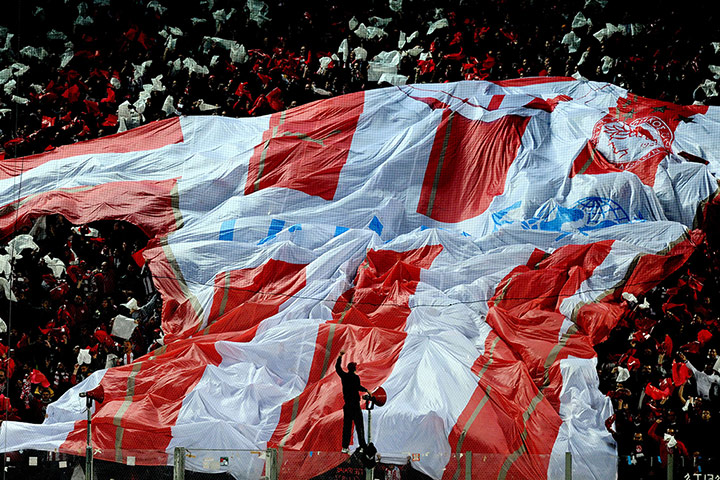 united champions league: Olympiakos fans cheer their team