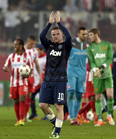 united champions league: Wayne Rooney applauds