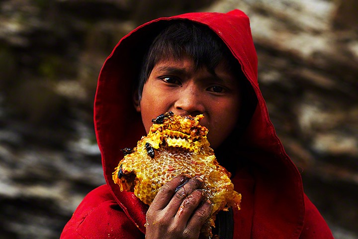 Young-Nepalese-boy-eating-003.jpg