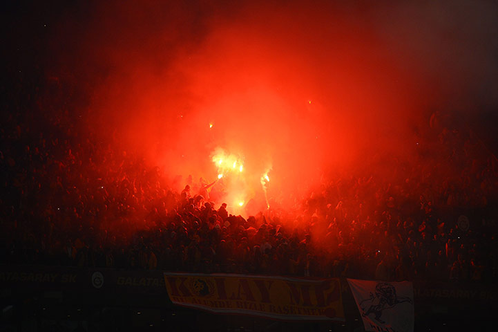 galatasary v chelsea: The Galatasaray fans get flarey
